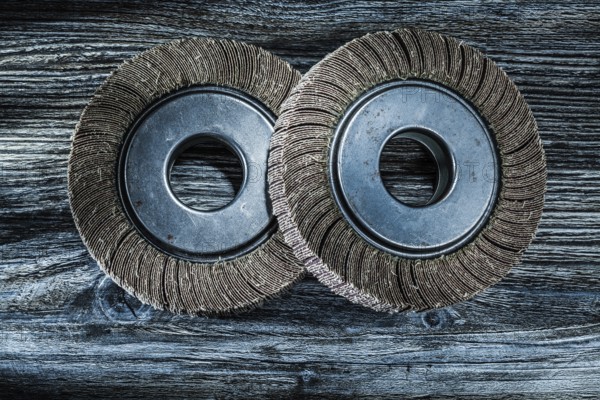 Used polishing flap discs on vintage wooden board