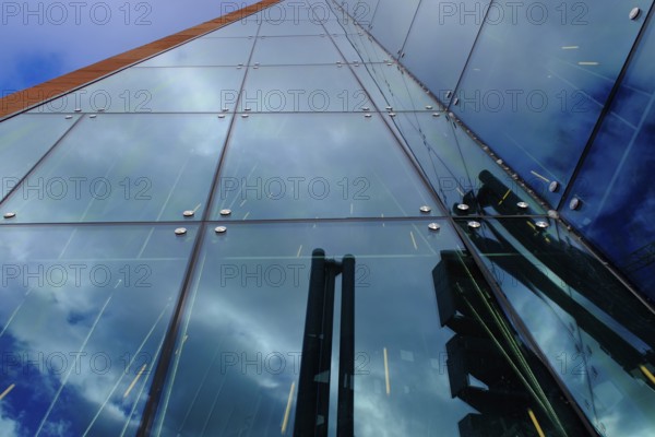 Building in the Hafencity with glass façade, reflection, Hanseatic City of Hamburg, Germany