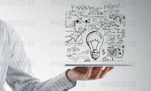 Close view of businessman presenting his business plan on tablet screen