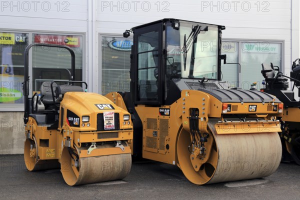 LIETO, FINLAND, MARCH 25, 2017: Cat CB22B utility compactor and CB44B Tandem Vibratory roller as seen at the annual public event of Konekaupan Villi Lansi Machinery Sales