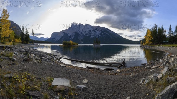 Beautiful autumn landscape scene in lake and mountain in background in west Canada
