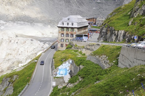 Hotel Belvedere by the road in Alps, Switzerland