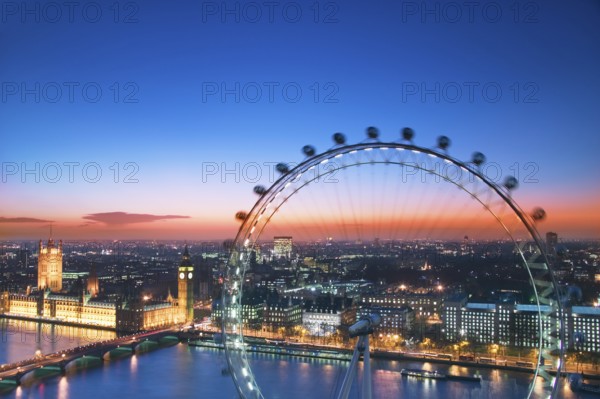 Houses of Parliament and London Eye at dusk