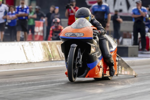 Sep 22, 2023-Concord, NC: NHRA Pro Stock Motorcycles Series driver, Jianna Evaristo, runs down the lane during a qualifying session for the Betway Carolina Nationals