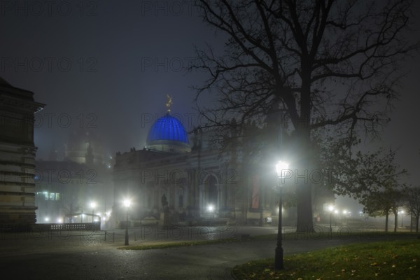 Dresden's old town shrouded in November fog. Brühl's Garden. View of the Lipsius Building, Foggy mood in Dresden, Dresden, Saxony, Germany