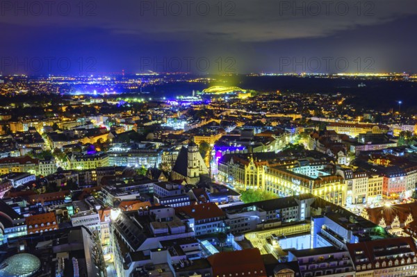 A panoramic view of Leipzig at night from the city skyscraper at Augustusplatz