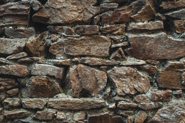 Stone wall. Outdoor background natural stone