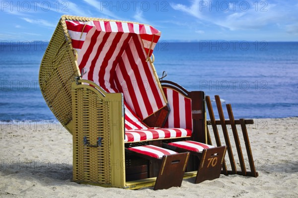 Beach chairs on Timmendorfer Strand on the Baltic sea with blue sky