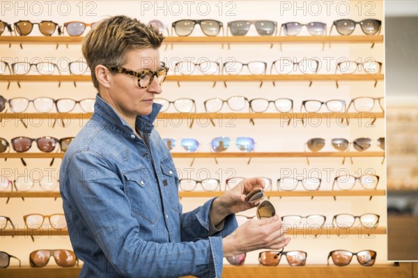 An image of a woman in a eyewear store
