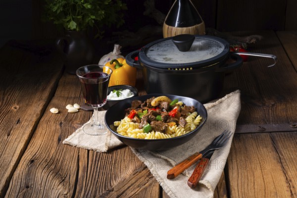Fussili pasta with minced spiced goulash and paprika