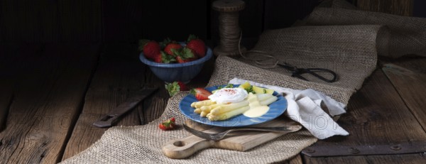 Boiled asparagus with egg and potatoes