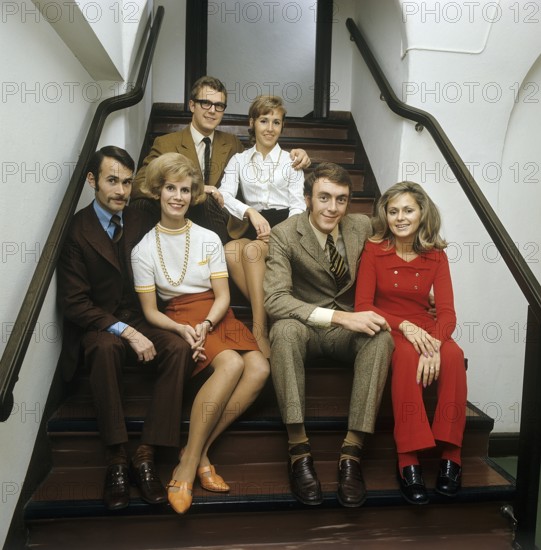 1960s parents. Three couples are sitting together in a stairway. Sweden november 13 1969. ref CV34-1