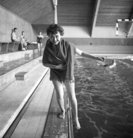 Lena Söderblom. Actor. Born October 24, 1935. In 1954 she appeared in the film Flickan i regnet in the role of the school student Burret, the picture taken in connection with the recording that took place in the swimming hall at Sigtuna humanistic teaching institute in 1954. Kristoffersson ref BP32-7