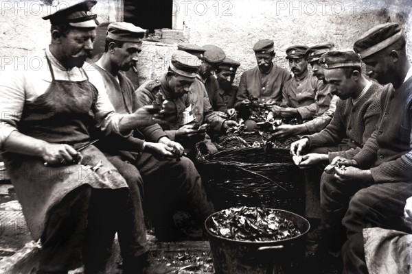 German soldiers on kitchen duty. First World War, France. German soldiers during kitchen duty. World War I, France