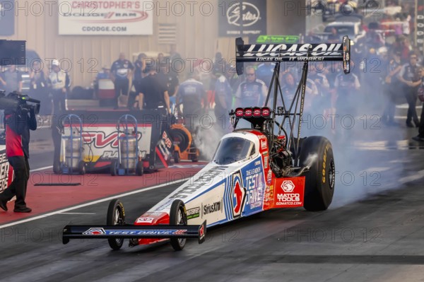 NHRA driver, Antron Brown, prepares to qualify for the Dodge Power Brokers NHRA Mile-High Nationals in Morrison, CO, USA