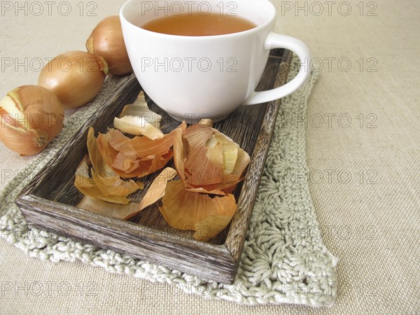 A cup of healthy onion skin tea, tea made from onion skins
