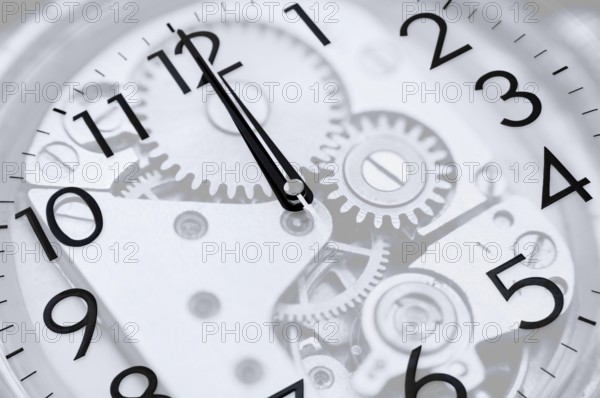 Twelve oclock (midnight or midday) on clock, double exposure