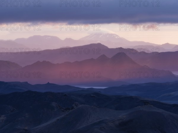 Cloudy mood and evening light at sunset, view from Mount Sveinstindur, volcanic landscape, mountains, Icelandic highlands, Iceland