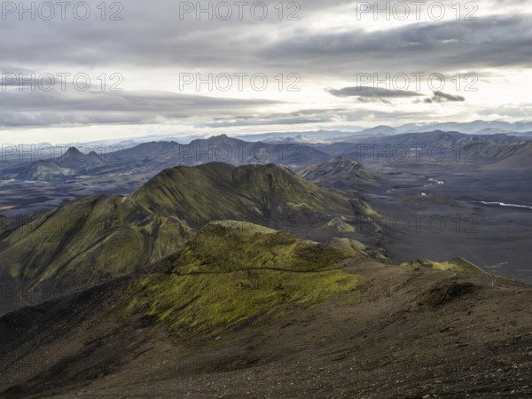 View from Mount Sveinstindur, volcanic landscape, moss-covered hills, mountains, Icelandic highlands, Iceland