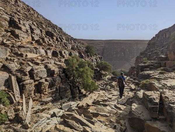 Hiking through the stone desert near Amtoudi in the Anti-Atlas, Morocco