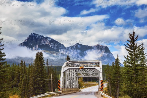 Bridge over the river in the picturesque mountain reserve. Canadian Rocky Mountains, Jasper National Park