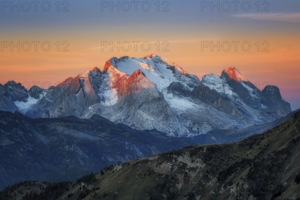 The view from Passo Giau to the Marmolada massif after colour sunrise