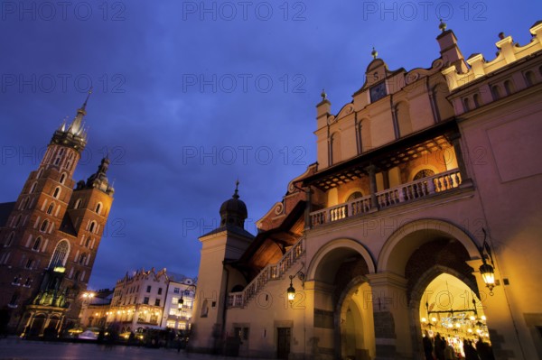 The city of Krakow in Poland. Market square with (from left to right) St Mary's Cathedral, Tuchlauben Austria