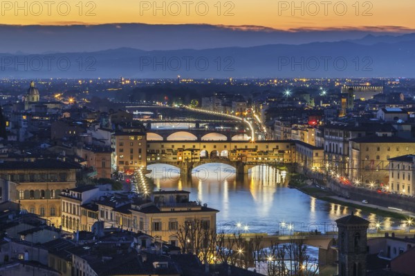 View of Florence with Ponte Vecchio in evening from Michelangelo hill, Italy