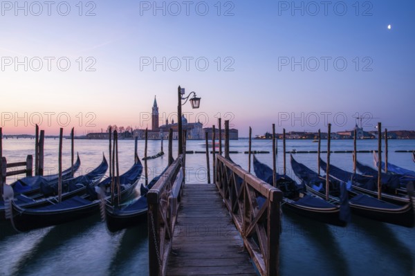 Dawn, Venetian gondolas with the church of San Giorgio Maggiore in the background, Venice, UNESCO World Heritage Site, Veneto, Italy