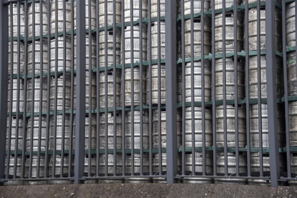 Stack of beer barrels in a brewery factory