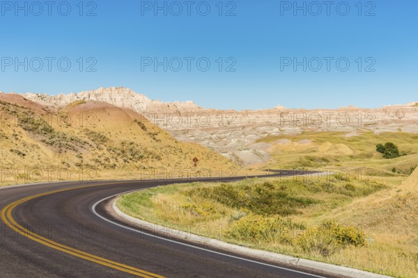 Fascinating colorful hills along the road leading through Badlands National Park, USA