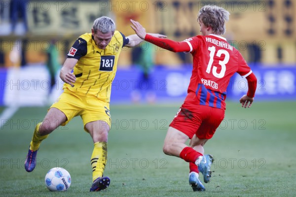 Germany: Soccer 1st Bundesliga, Matchday 20 - 1. FC Heidenheim vs. Borussia Dortmund - Voith-Arena Heidenheim: Frans KRÄTZIG 1. FC Heidenheim right in duel with Julian RYERSON Borussia Dortmund on the ball