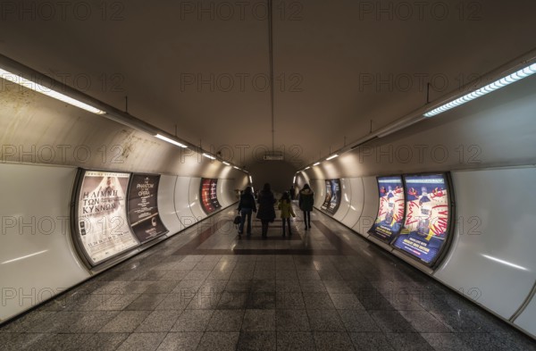Athens Old Town, Attica, Greece, 12 28 2019 People walking through the main connection hall of the Syntagma underground metro