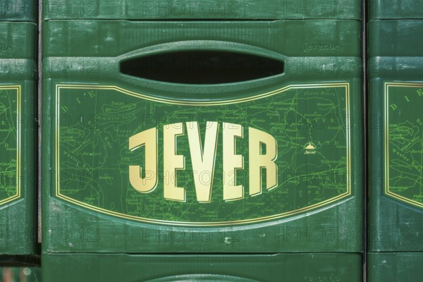 Stacked Jever beer crates in front of the Frisian Brewery, Jever Brewery, Jever, East Frisia, Lower Saxony, Germany