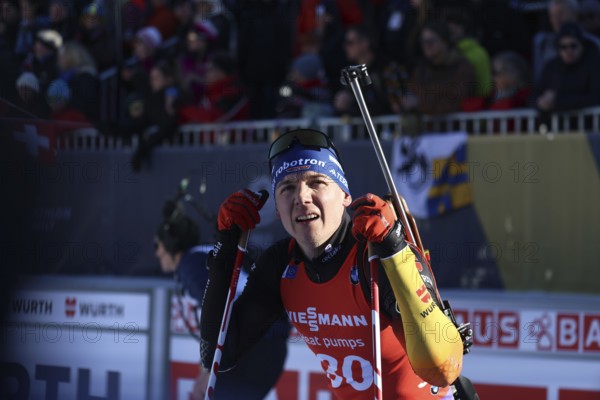 Justus Strelow (SG Stahl Schmiedeberg/GER) with an anxious look at the scoreboard at the IBU Biathlon World Championships Lenzerheide 2025, Lenzerheide, Switzerland / SUI / CH
