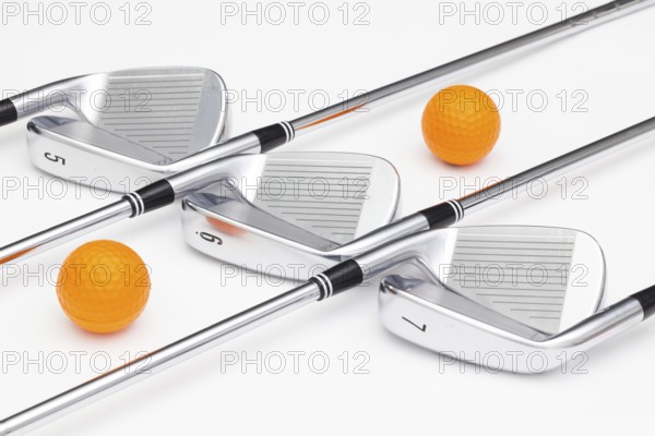 Titanium golf clubs on the white background