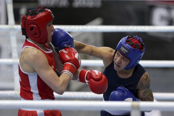 Sofia, Bulgaria. 27th February, 2021. Mira Potkonen (red) of Finland and Beatriz Ferreira of Brazil fight in their final round of Light Welter (W60kg) category of the 72-nd International Boxing Tournament Strandja 2021, Sofia, Bulgaria