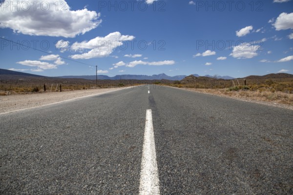 Endlessly straight road in the vastness of Africa