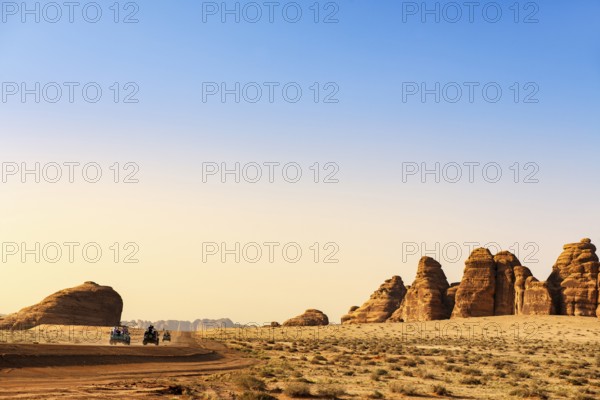 Vintage Land Rover Tour in the rocky landscape of Hegra, Unesco World Heritage Site Al Ula, Kingdom of Saudi Arabia