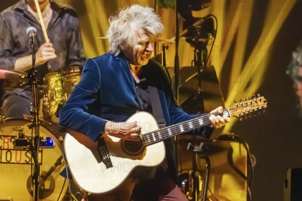 MELBOURNE, AUSTRALIA - DECEMBER 10: Neil Finn of Crowded House performs at Rod Laver Arena on December 10, 2024 in Melbourne, Australia