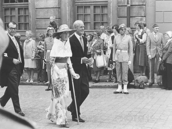 Estelle Bernadotte. Born Estelle Romaine Manville. 1894-1984. She was married to count Folke Bernadotte. Pictured walking aside her husband Carl-Erik Ekstrand as wedding guests at the wedding between King Carl XVI Gustaf and queen Silvia 19 june 1976. Her son Folke Bernadotte is walking behind them