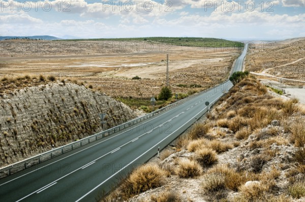 Asphalt road and white line marking. Close up low viewpoint