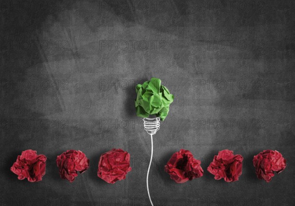Inspiration concept with crumpled paper light bulb as good idea
