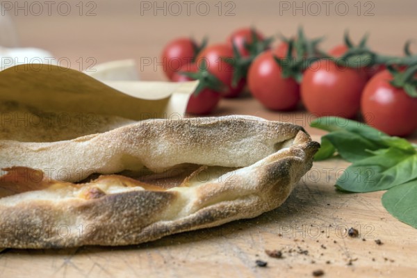 Pinsa romana and scrocchiarella gourmet italian cuisine. Traditional dish in italy