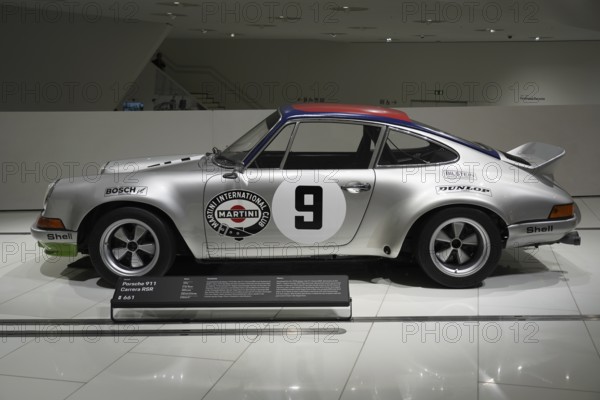 Porsche 911 Carerra RSA silver Porsche 911 on display in the museum with Martini Racing design, New Porsche Museum 2009, Stuttgart, Baden-Württemberg, Germany