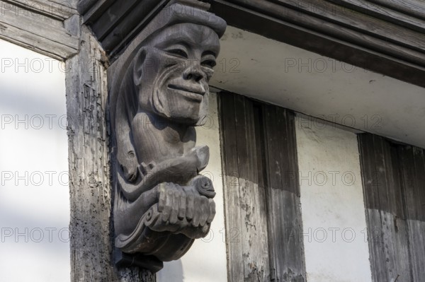 Totnes, Devon, UK, January 16. View of a wooden gargoyle in Totnes, Devon on January 16, 2024