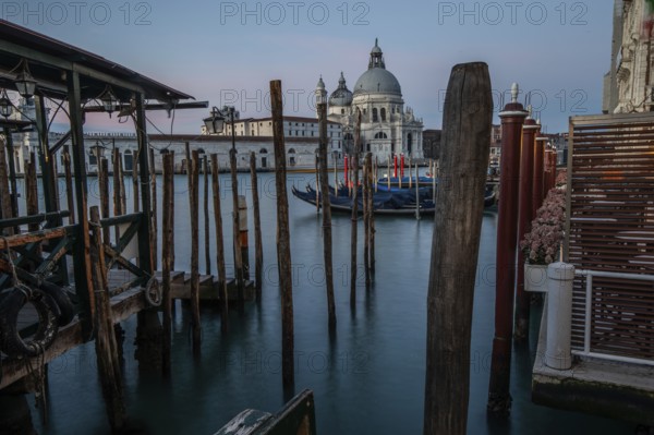 Gondola jetty, Venetian gondolas with the church of Santa Maria della Salute in the background, Venice, UNESCO World Heritage Site, Veneto, Italy