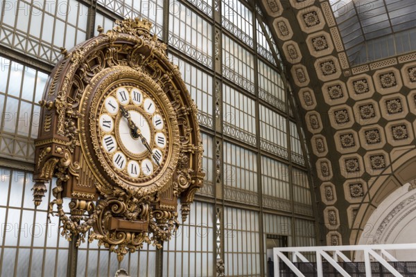 PARIS, FRANCE, MAY 29, 2022, Ornate clock at the main hall of famous museum d'Orsay in Paris, France