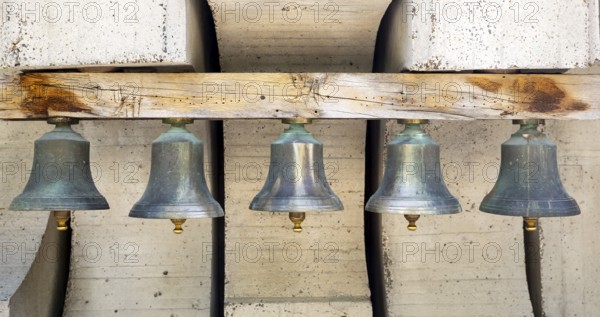 Many old bells - campanes are seen in a row