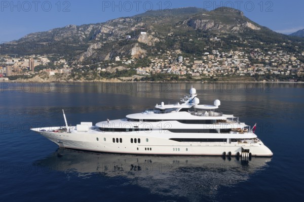 Aerial view 78, 43 metre long motor yacht EMINENCE, delivered in 2008 by the German shipyard Abeking & Rasmussen, design Reymond Langton Design Ltd., at anchor off the Principality of Monaco, Mediterranean Sea